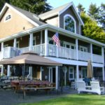 Vashon Island VRBO - KVI Beach House back of house facing the beach